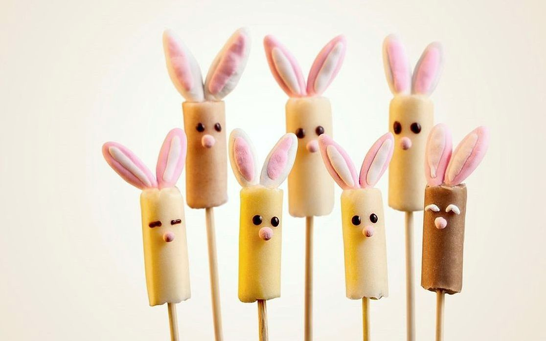 An ice cream lollipop with swirled chocolate coating